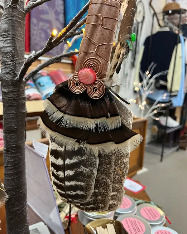 Feather and beadwork sculpture