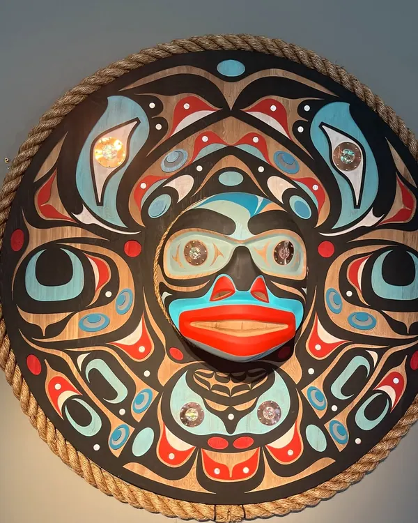 Painted Northwest Coast panel in a rope frame