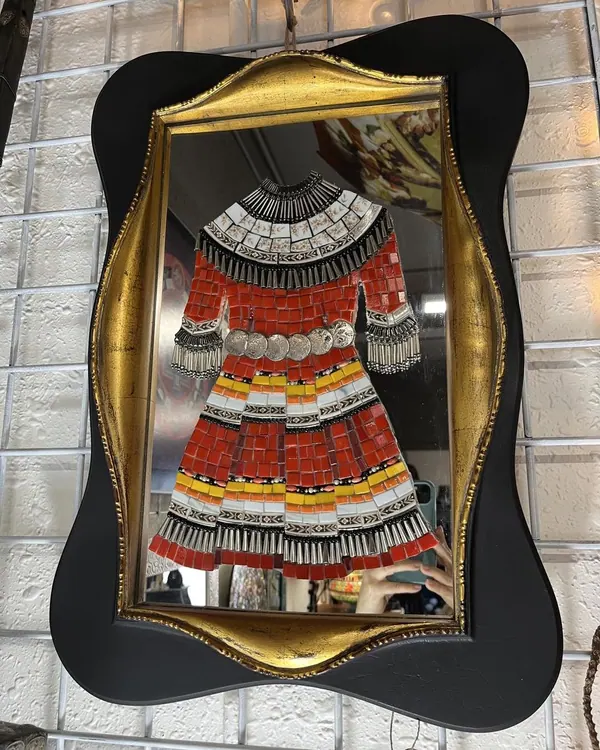 Black scalloped wall mirror