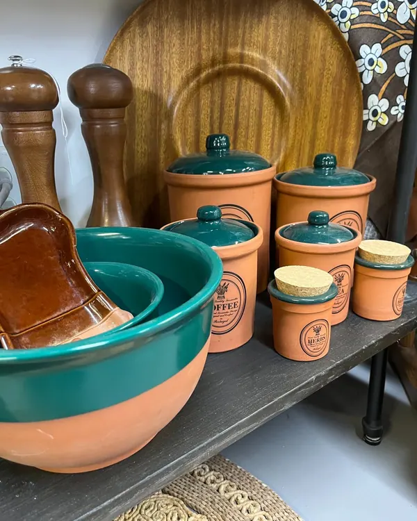 Terracotta canisters, mixing bowls and pepper mills