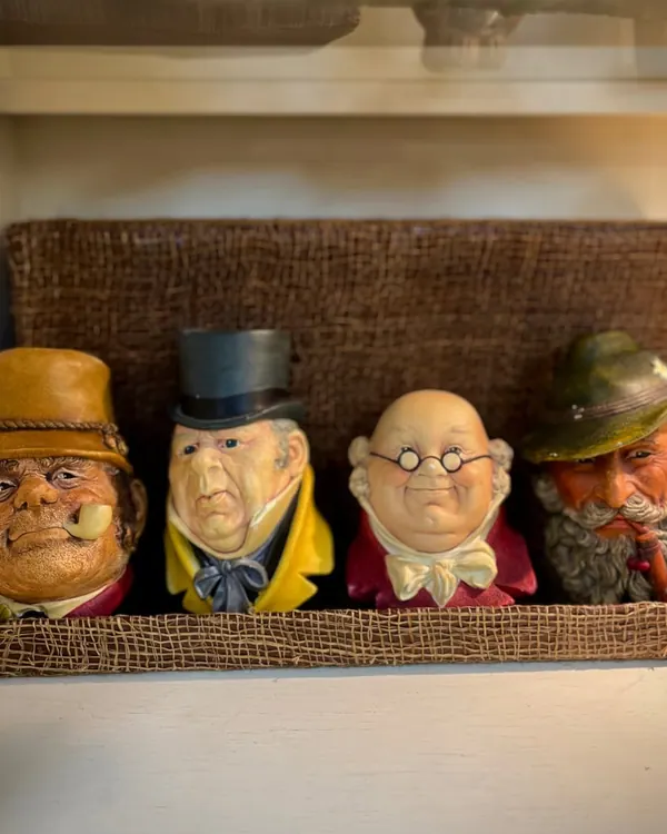 Row of character head wall plaques