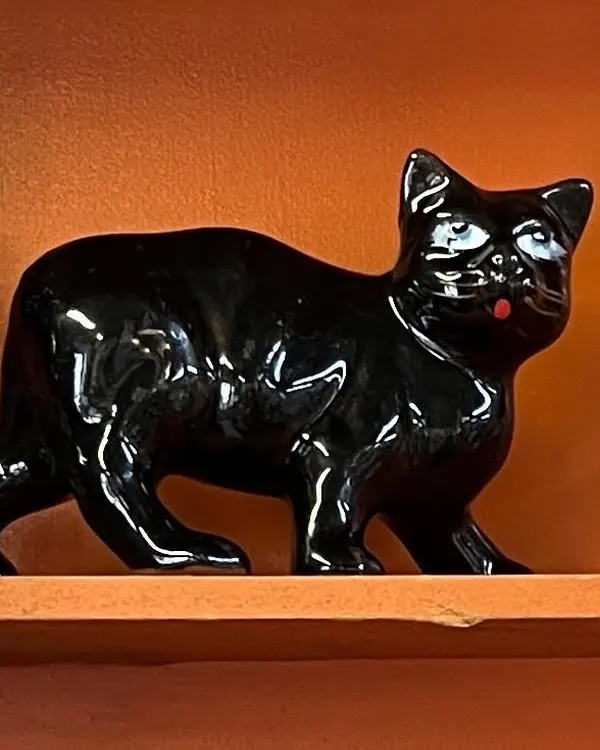 Black ceramic cat figurine