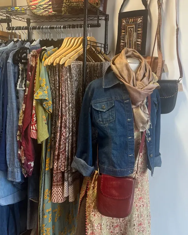 Rack of denim jackets and scarves