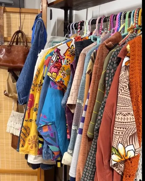 Rail of colourful patterned jackets and dresses